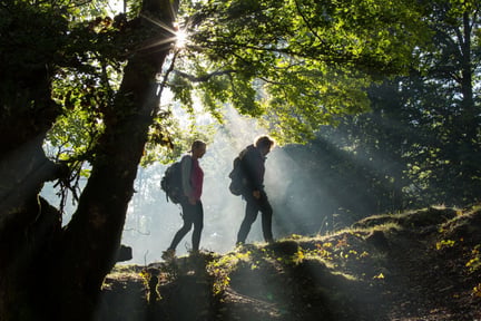 Young women hiking in the Apennines Marsican Bear Heritage Area.
